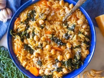 Step 5 Serving chickpea orzo with olive oil and parmesan for healthy one skillet dinner.
