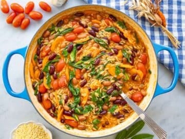 Step 5 wilting spinach into orzo and beans for easy nutritious finish.