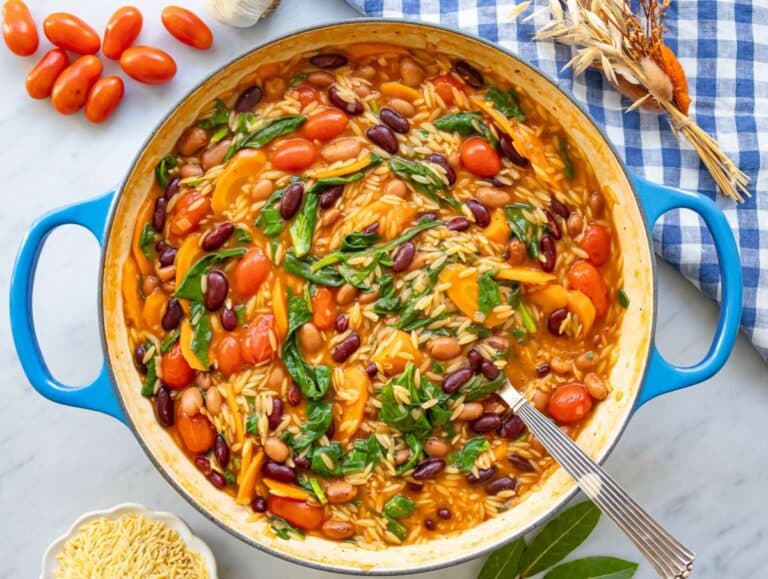 Step 5 wilting spinach into orzo and beans for easy nutritious finish.