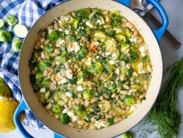 Step four finishing with lemon herbs and feta before serving.
