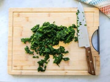 Step one thawed chopped spinach on a cutting board.