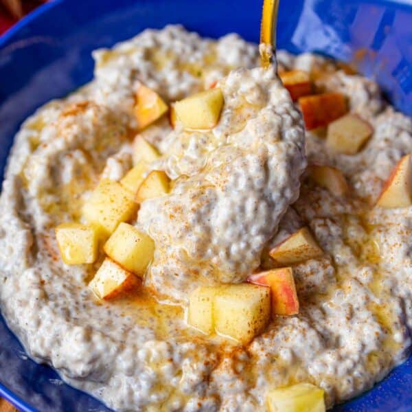 Apple chia pudding in a bowl served as a beautiful Mediterranean diet breakfast with apples.