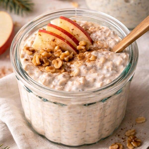 Apple overnight oats served for christmas morning with walnuts.
