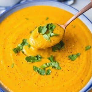 Creamy sweet potato chickpea soup easy one pot vegetarian meal in a simple bowl.