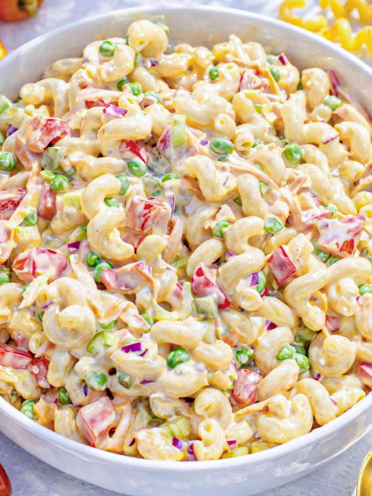 Finished dish top view Greek yogurt macaroni salad served chilled and ready for potluck.