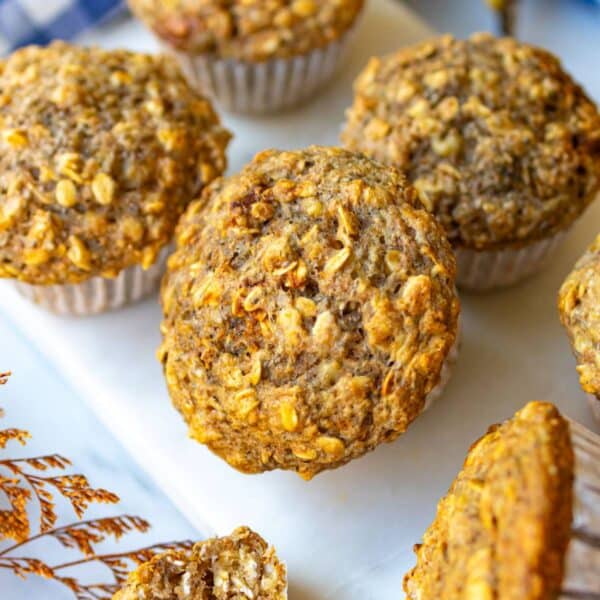 Healthy oatmeal muffins stacked for a nutritious budget friendly breakfast idea.