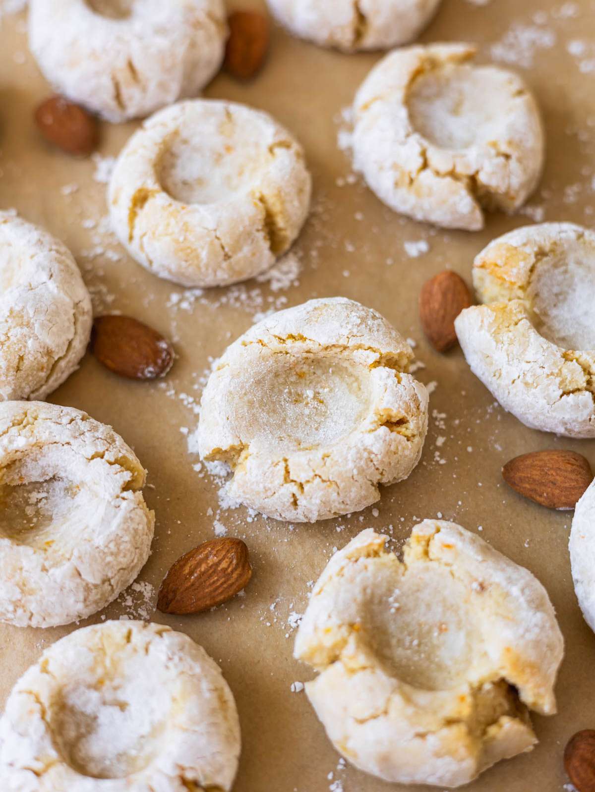 Italian almond cookies arranged on baking sheet ready to serve.