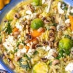 Mediterranean one pot vegetable orzo served in a bowl.