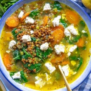 Quick lemon lentil soup in rustic bowl styled for cozy winter dinner.
