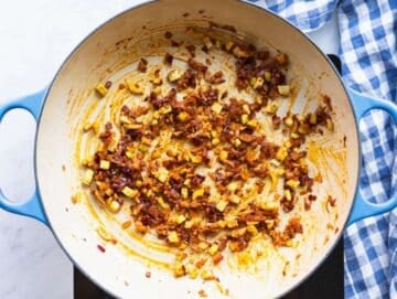 Step 1 Cooking onion celery and garlic in olive oil to build flavor for sweet potato chickpea soup.