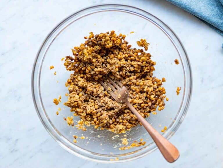Step 1 Drained lentils mashed in a bowl to prepare base for patties.