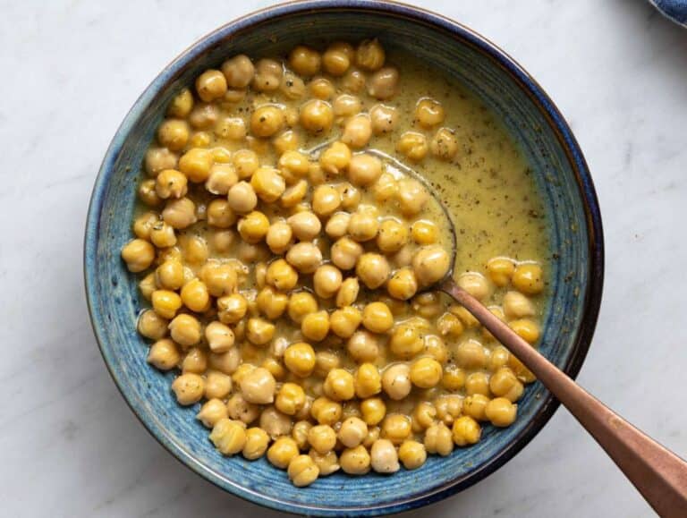 Step 1 Mixing citrus dressing and marinating chickpeas for orange fennel salad.