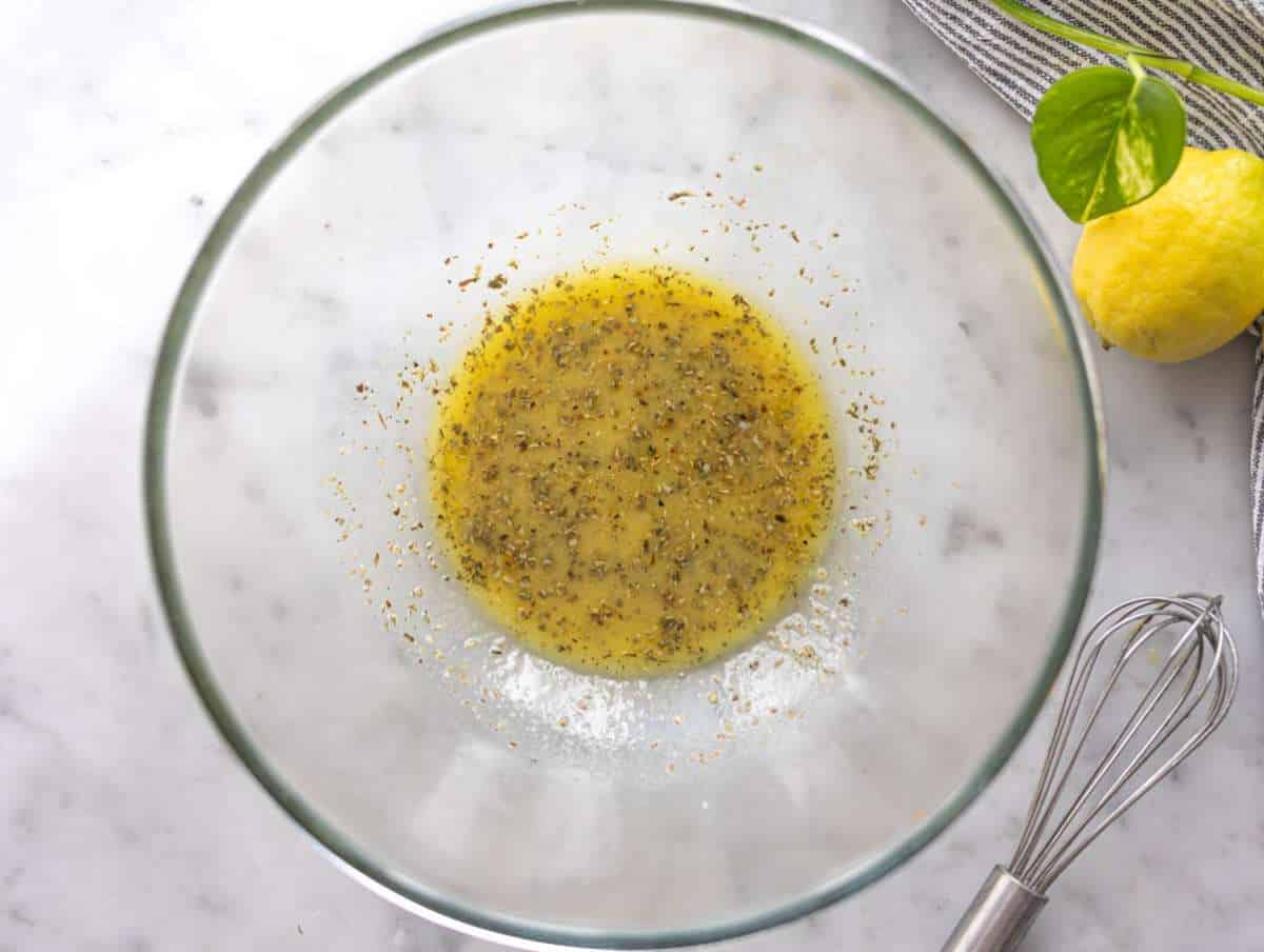 Step 1 Whisking lemon dressing in a large bowl for black eyed pea salad.