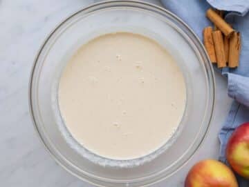 Step 1 Whisking the liquid base milk yogurt honey applesauce for this easy make ahead breakfast.