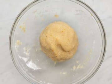 Step 2 Mixing the ingredients by hands to get a compact dough ball.