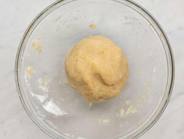 Step 2 Mixing the ingredients by hands to get a compact dough ball.