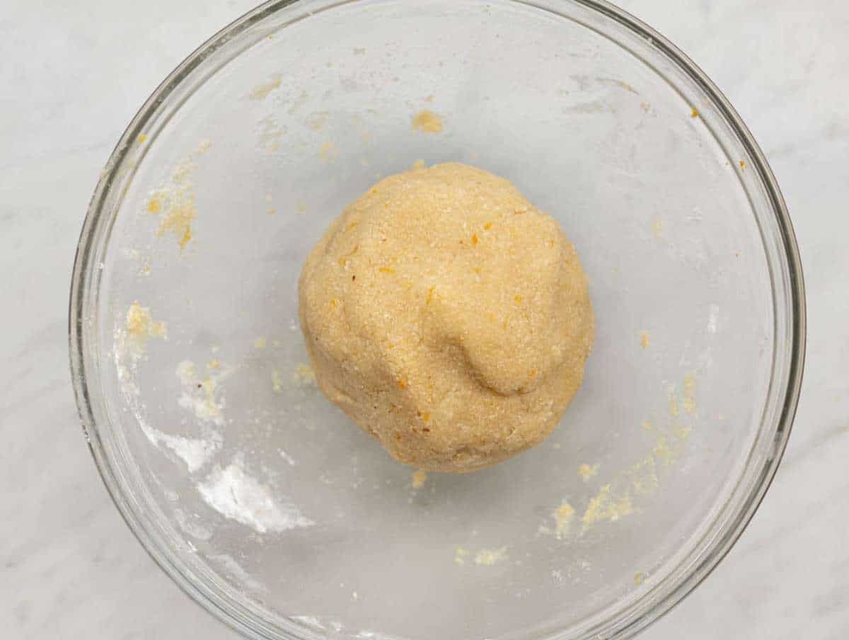 Step 2 Mixing the ingredients by hands to get a compact dough ball.