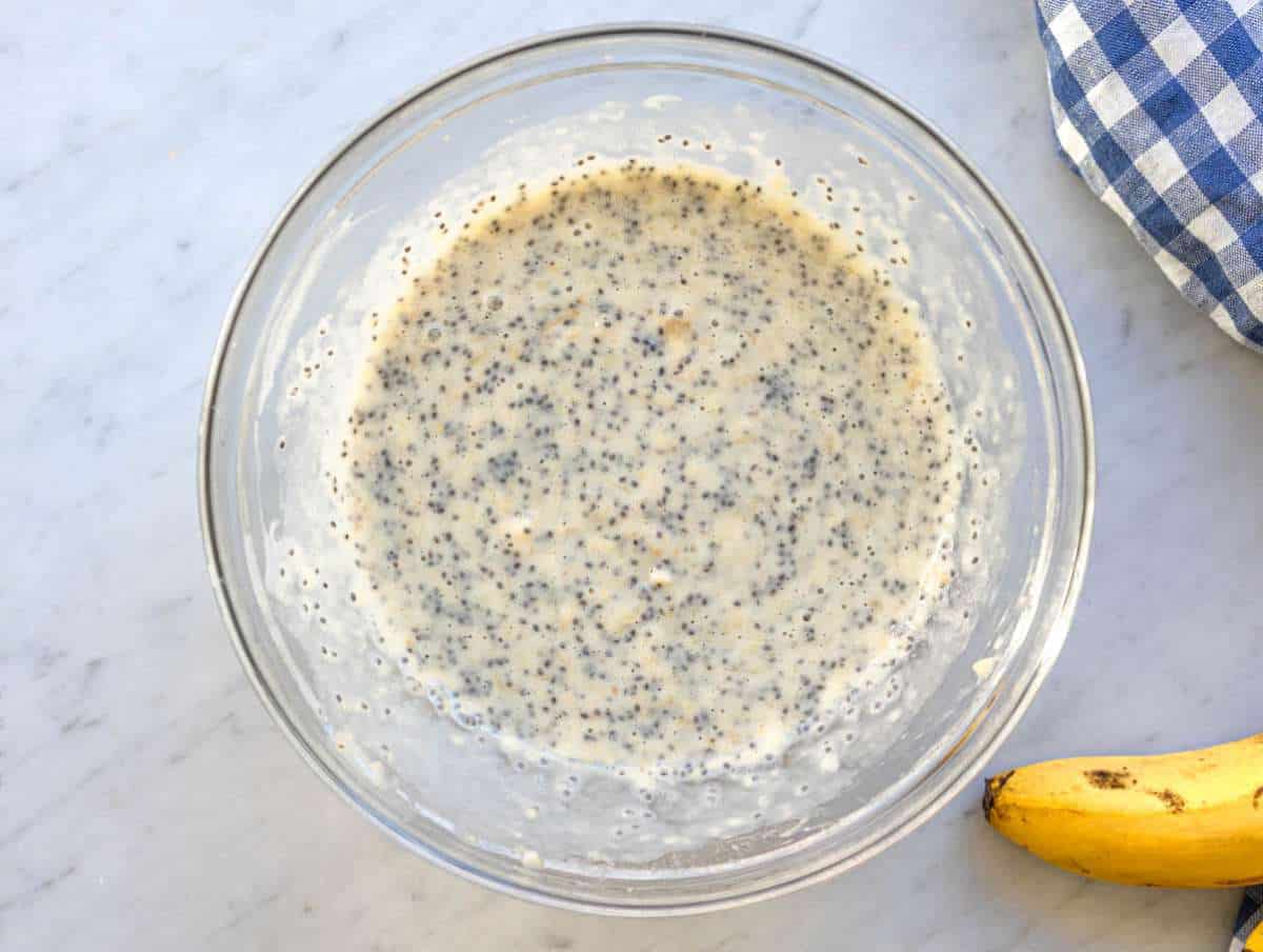 Step 2 Mixing wet ingredients for healthy oatmeal muffins in a large bowl.