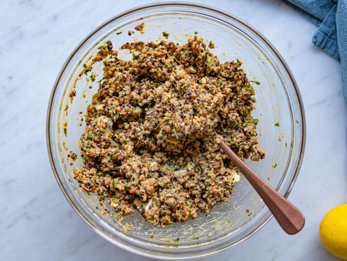 Step 2 Quinoa lentils herbs and feta mixed together for patty batter.