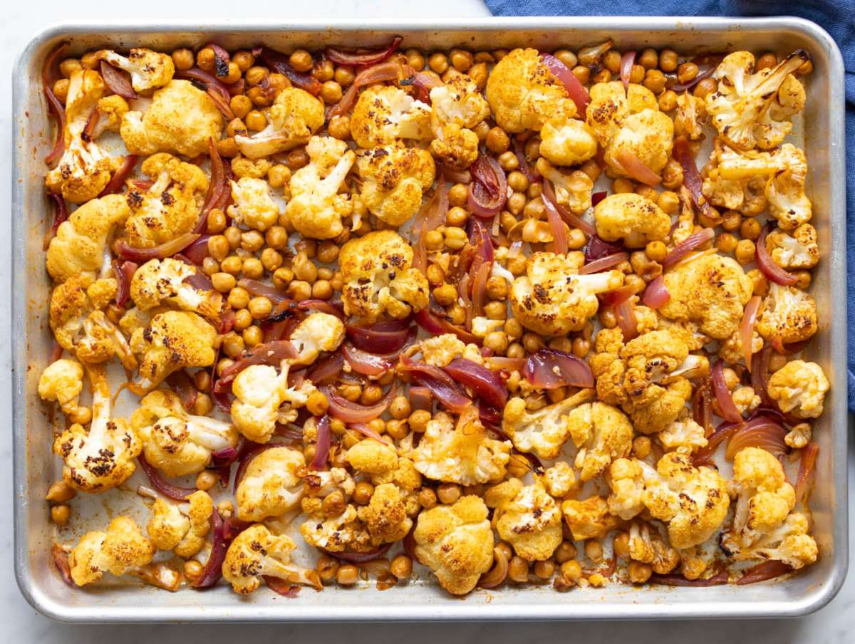 Step 2 Vegetables for cauliflower shawarma bowl roasted on sheet pan until golden tender and lightly charred.