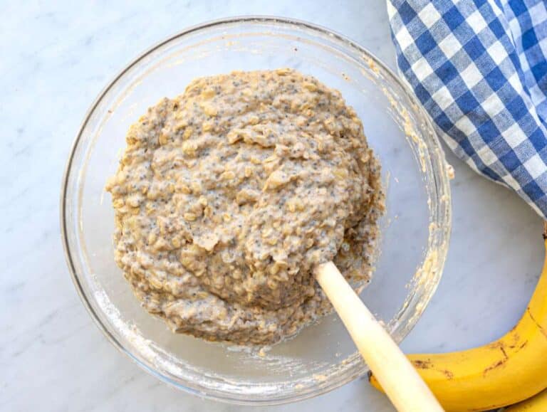 Step 3 Adding dry ingredients to create a tender whole wheat muffin batter.