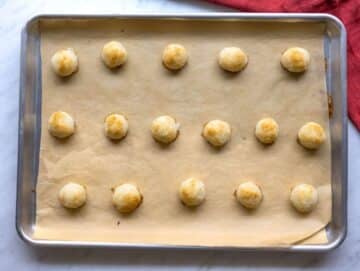 Step 3 Baking coconut macaroons until lightly golden in oven.