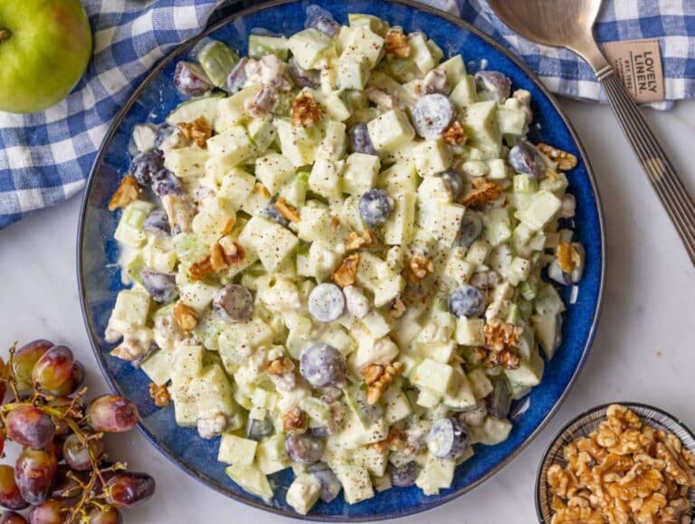 Step 3 Healthy Waldorf salad with Greek yogurt dressing served on a platter.