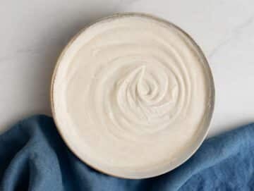 Step 3 Mixing Greek yogurt and lemon juice in a bowl to make a tasty and lemony sauce.