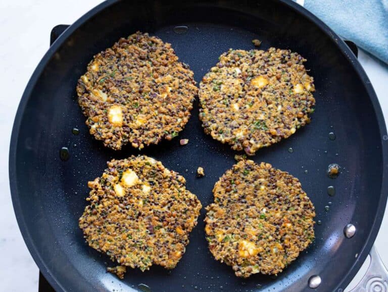 Step 3 Patties cooking in skillet becoming crisp and firm.