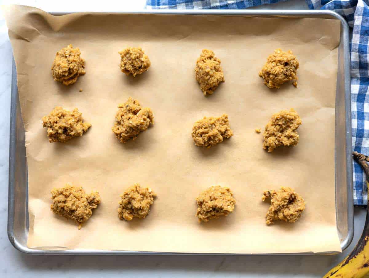 Step 3 Shaping soft banana cookies on baking sheet before baking.
