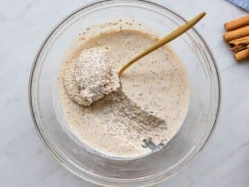 Step 3 Spoon scooping the thick protein-rich breakfast pudding after chilling overnight.