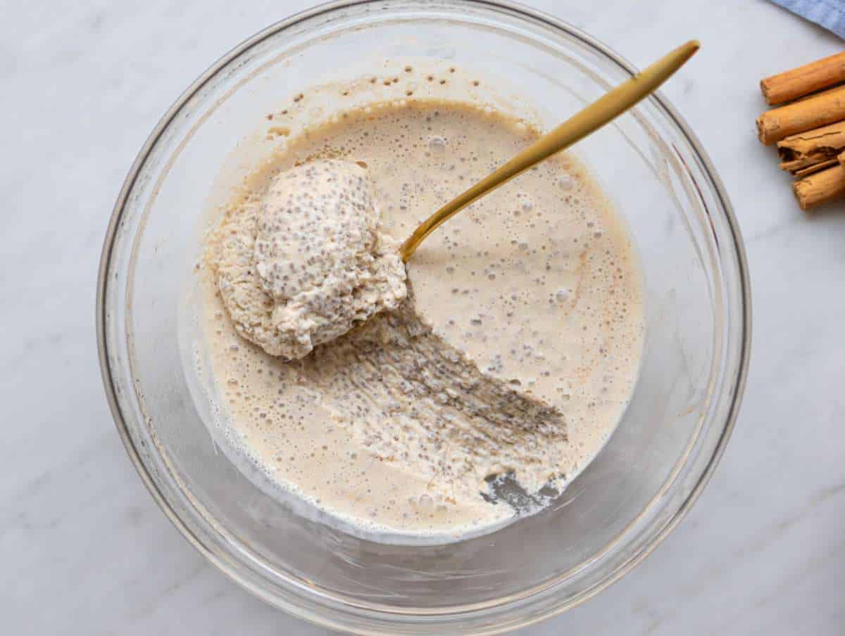 Step 3 Spoon scooping the thick protein-rich breakfast pudding after chilling overnight.