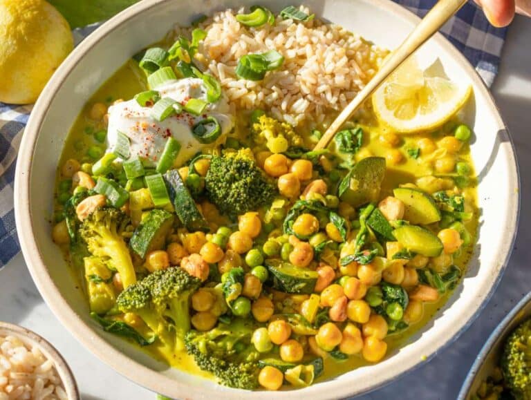 Step 4 Adding lemon zest and juice to finish the creamy vegetable curry and serving with rice.