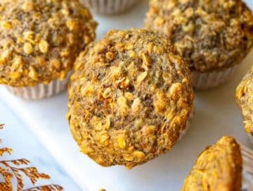 Step 5 Finished muffins on a marble cutting board served for a healthy breakfast.