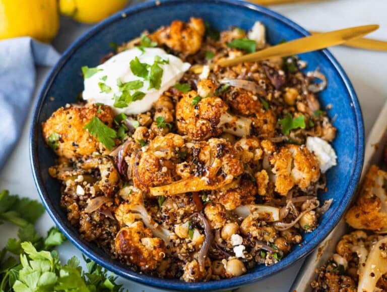 Step 5 Gyros style Greek cauliflower bowl served with greek yogurt and parsley.
