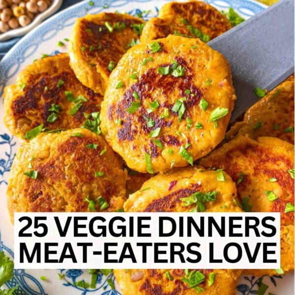 Vegetable dinner with sweet potato fritters on a blue plate.