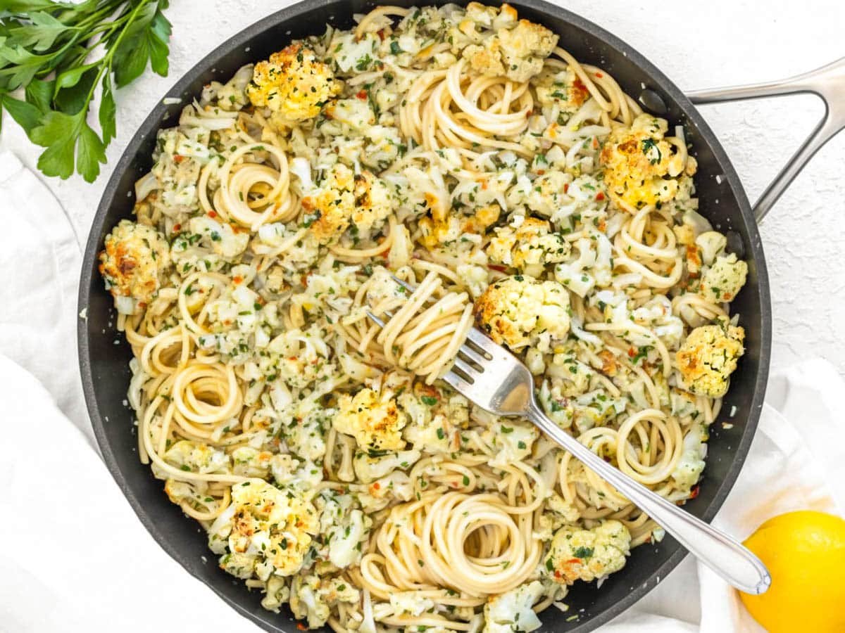 cauliflower pasta recipe with a silver fork.
