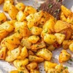 Batata harra potatoes roasted until golden and crisp with garlic and chili oil.