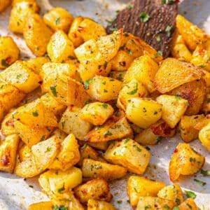 Batata harra potatoes roasted until golden and crisp with garlic and chili oil.
