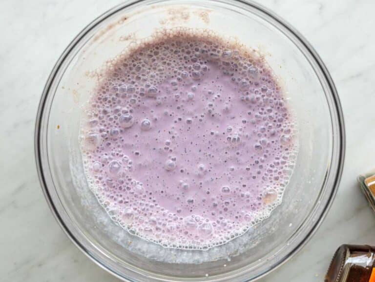 Step 1 Blended blueberry yogurt mixture smooth and purple in a mixing bowl.