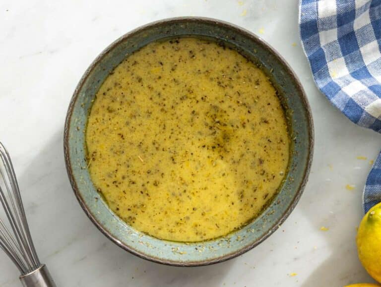 Step 1 Lemon dressing whisked in a bowl until smooth and glossy.