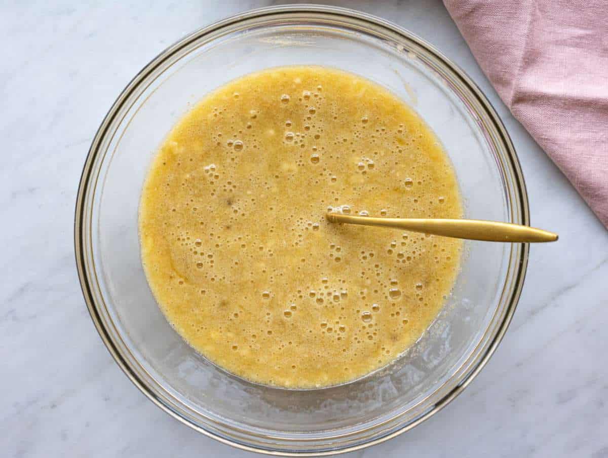 Step 1 Mashed ripe bananas mixed with oil sugar egg and vanilla in a large bowl.