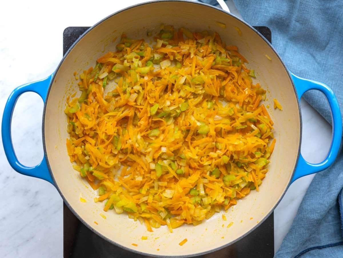 Step 1 Onion carrot and celery cooking gently in olive oil until soft.