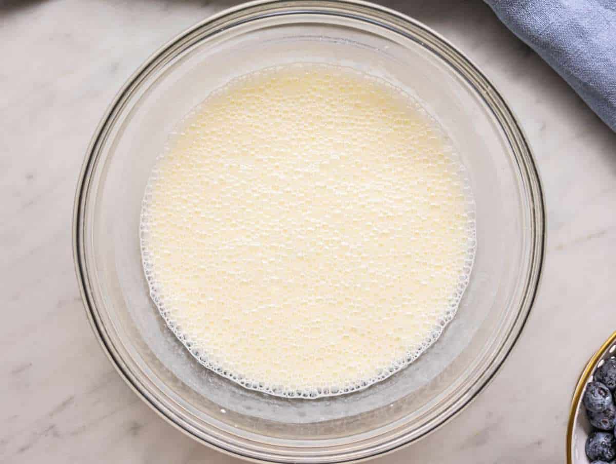 Step 1 Yogurt milk and honey being stirred together until smooth and creamy.