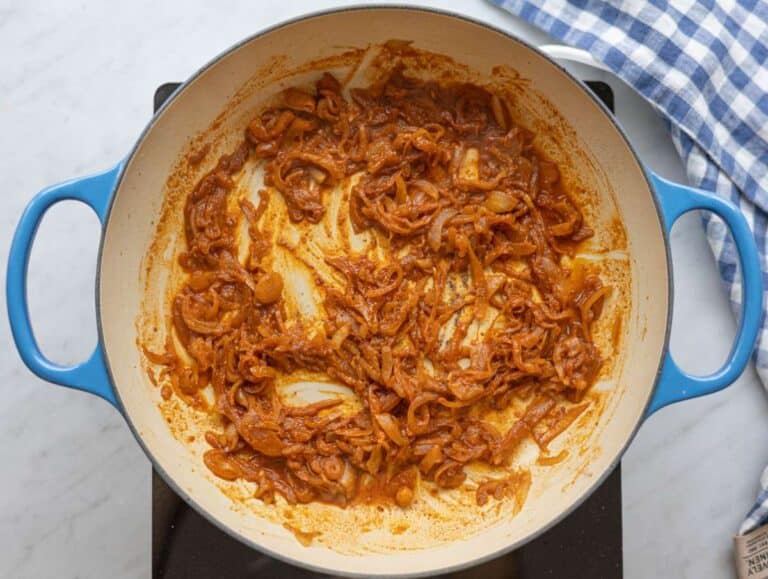 Step 2 Garlic and shawarma spices blooming gently in the skillet with a splash of water.