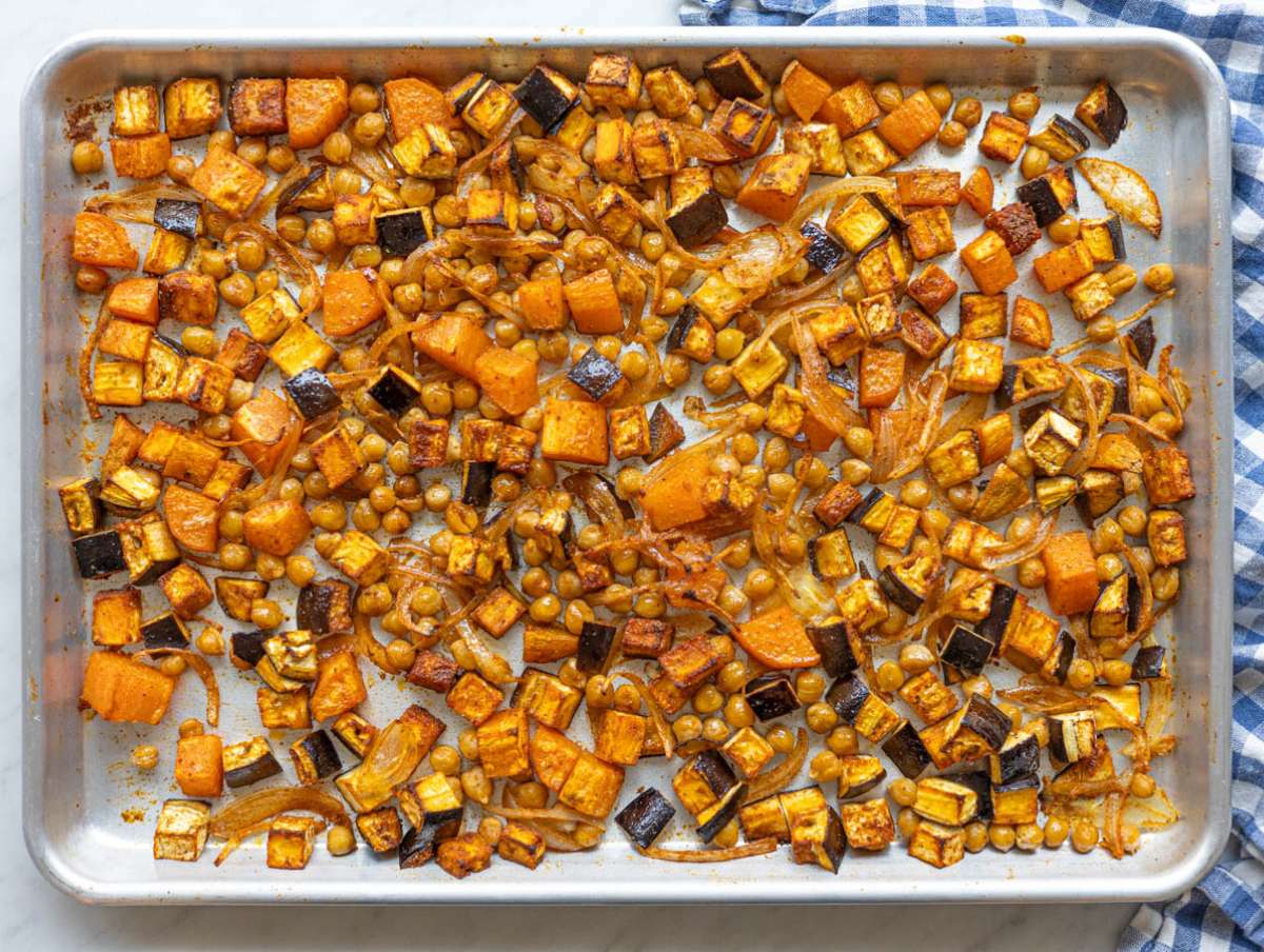 Step 2 Roasted chickpeas and vegetables on a sheet pan, lightly browned and caramelized.