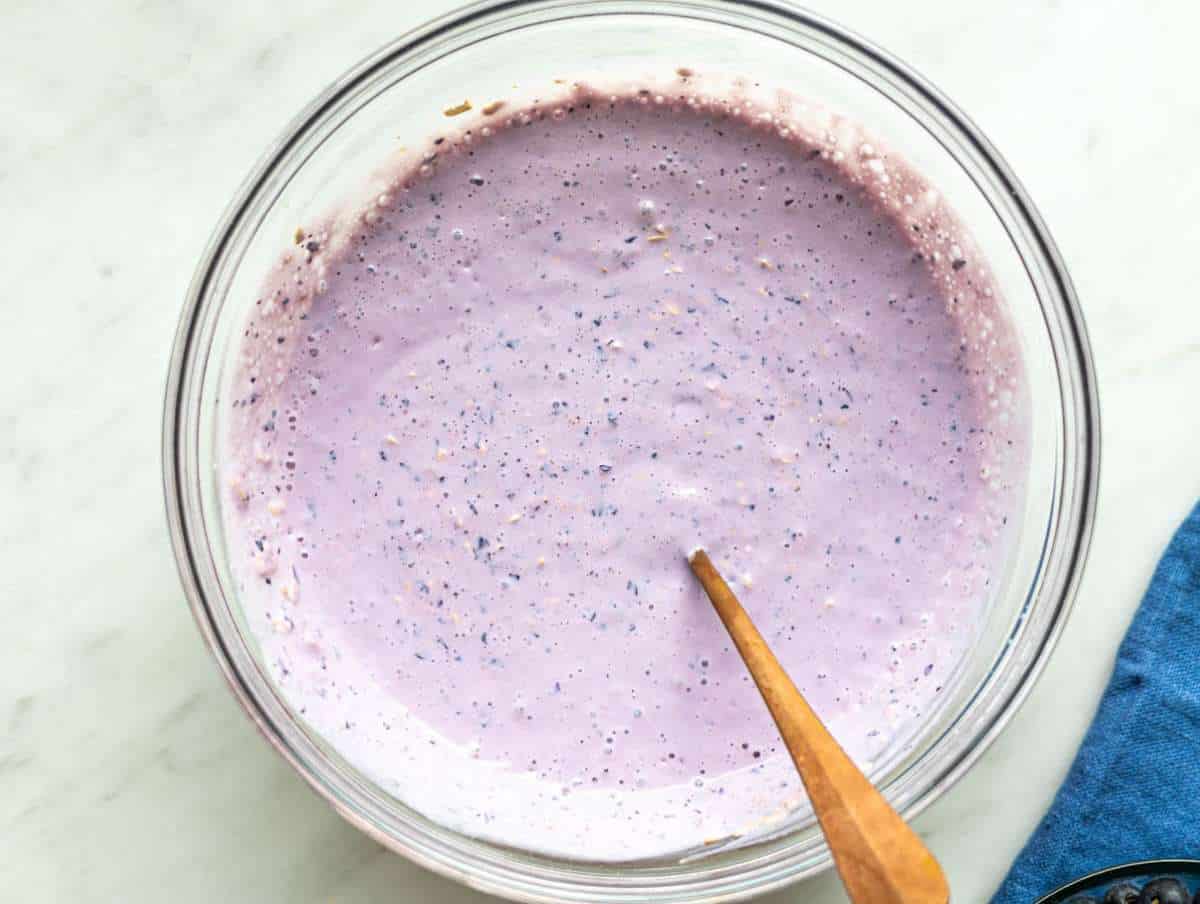Step 2 Rolled oats stirred into the blueberry yogurt mixture until fully coated.