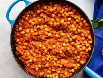 Step 3 Chickpeas simmering in tomato sauce until thick and spoonable.