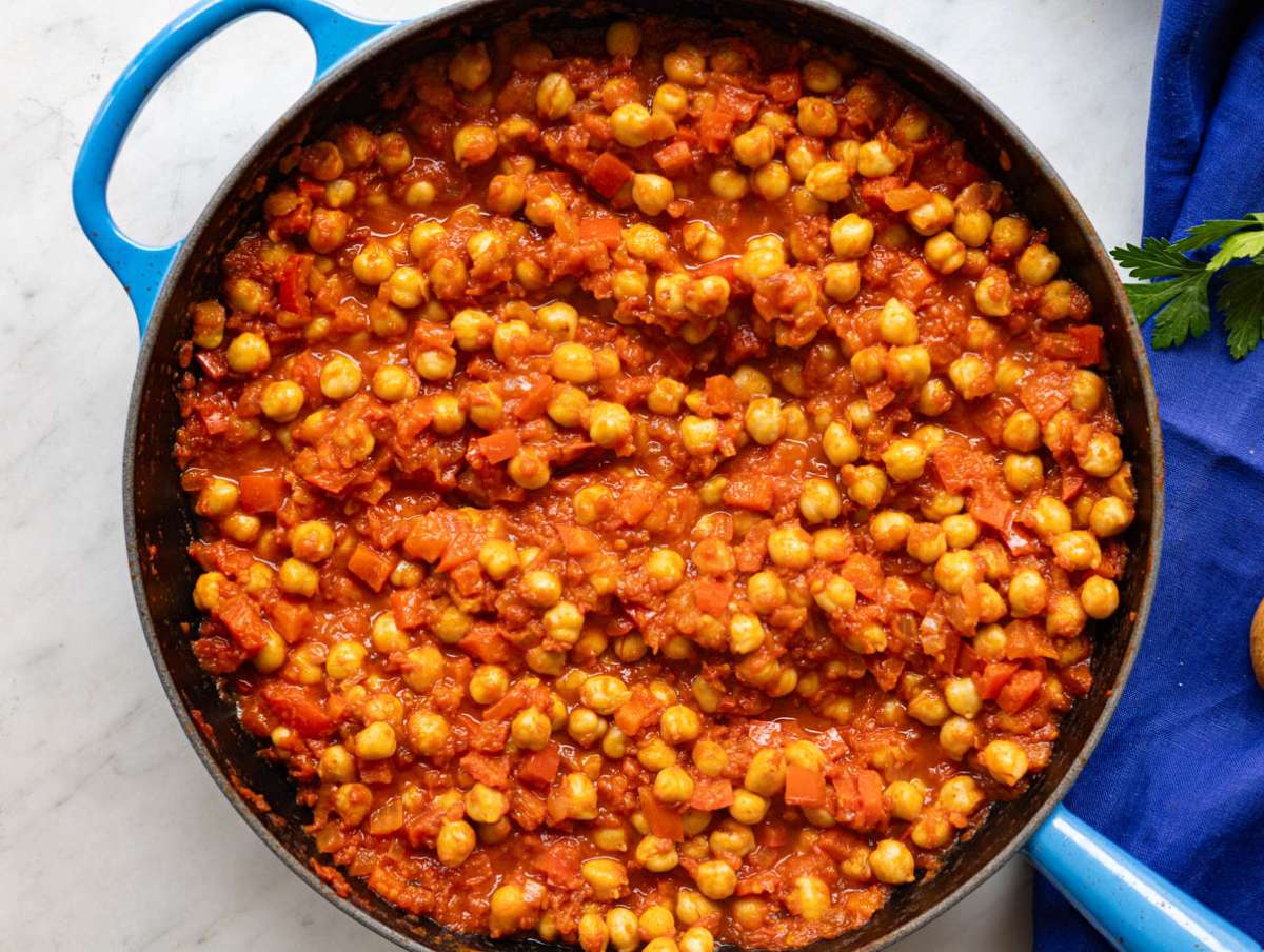 Step 3 Chickpeas simmering in tomato sauce until thick and spoonable.