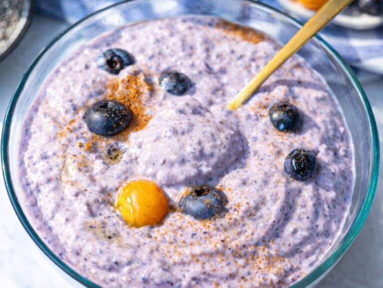 Step 3 Creamy blueberry chia pudding with Greek yogurt served for breakfast in a glass bowl